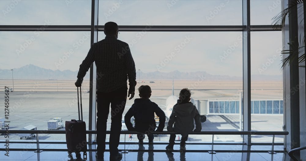 parent and two children at the airport
