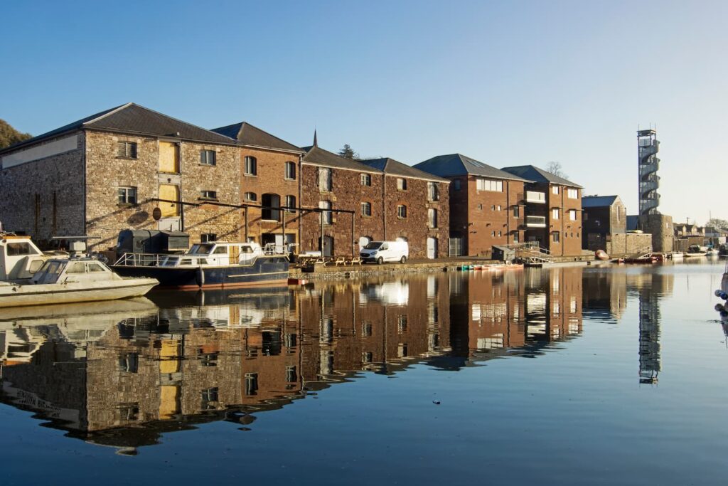 Skyline of the historic quayside of Exeter in Devon at sunrise, UK