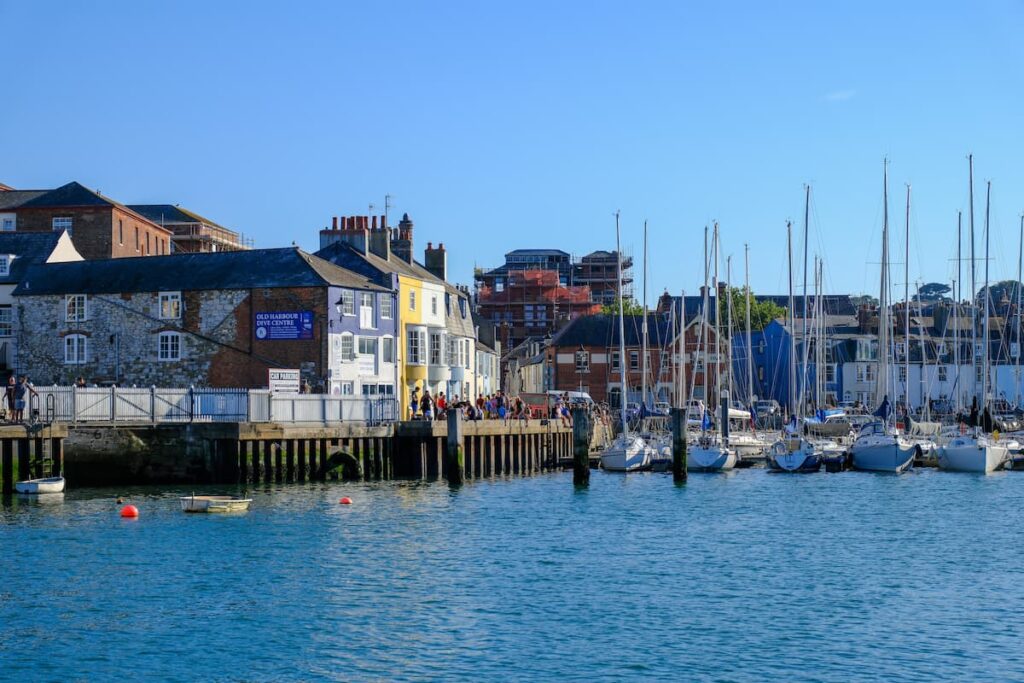 Weymouth Harbour and entrance showing boats moored and marina.