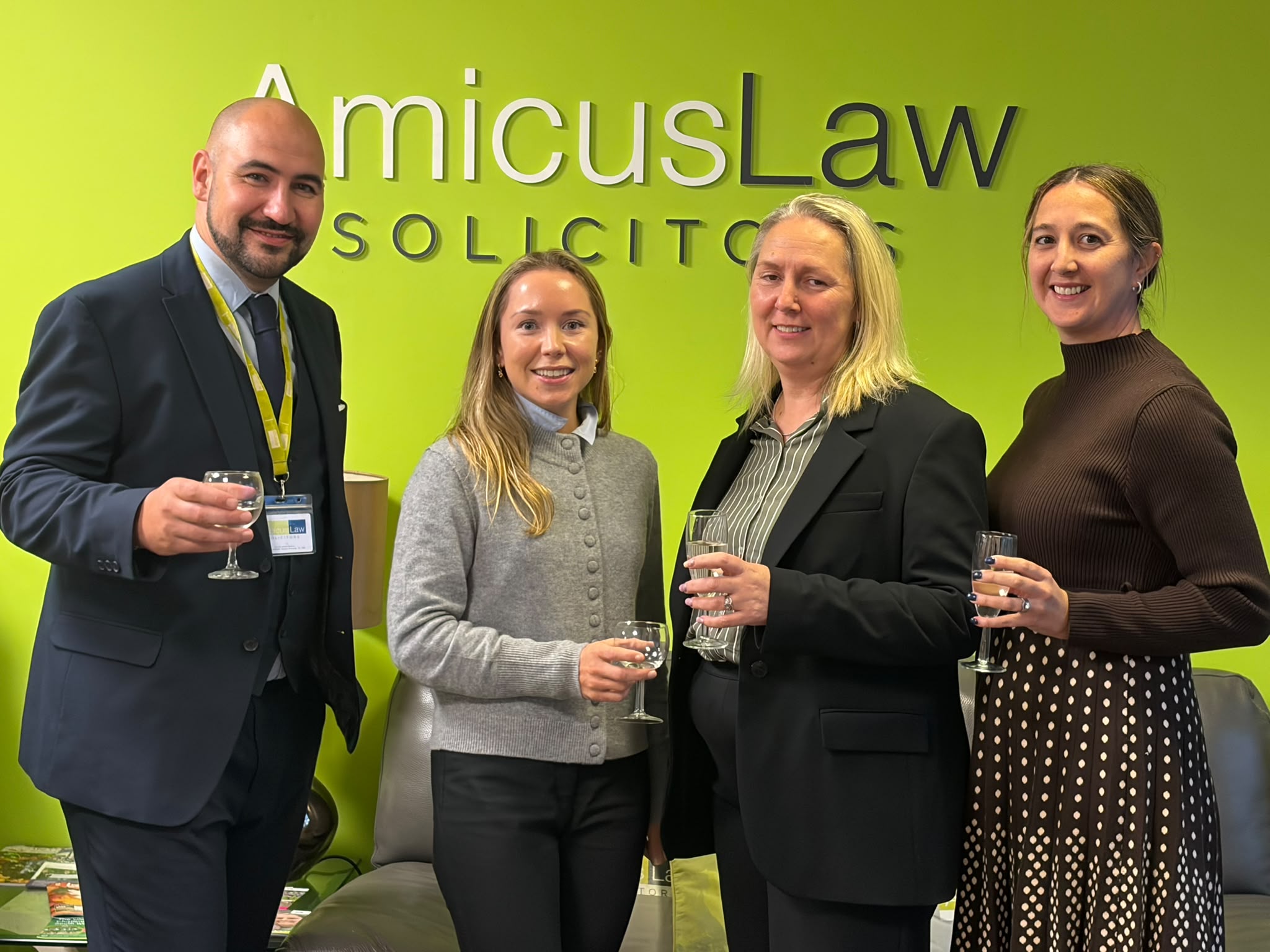 Four new Amicus Law Partners pictured together at Amicus Law, marking their progression into the Partnership.